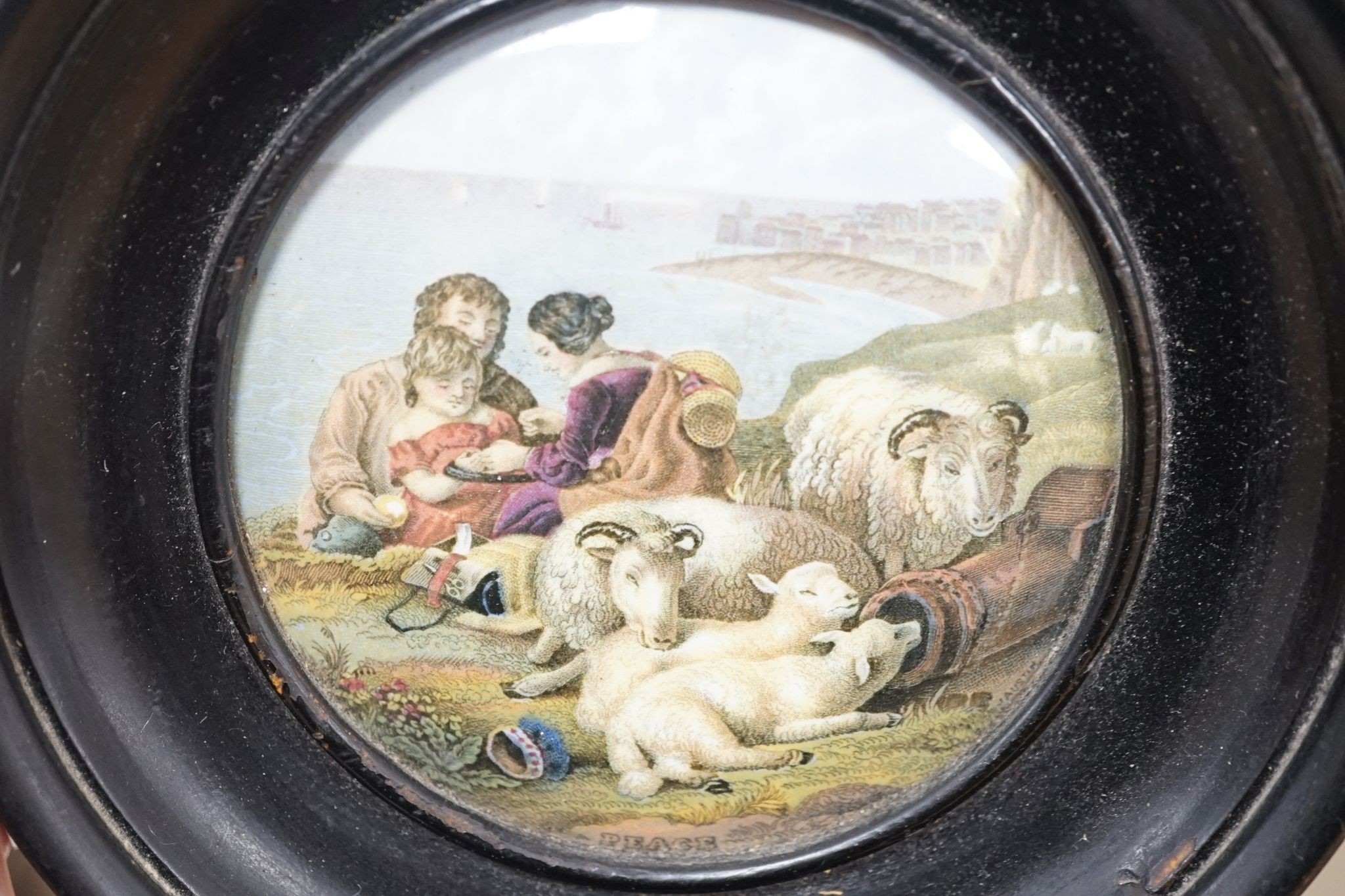 A group of 18th century delftware plates, Wedgwood majolica candlestand (a.f.) and two Victorian framed pot lids